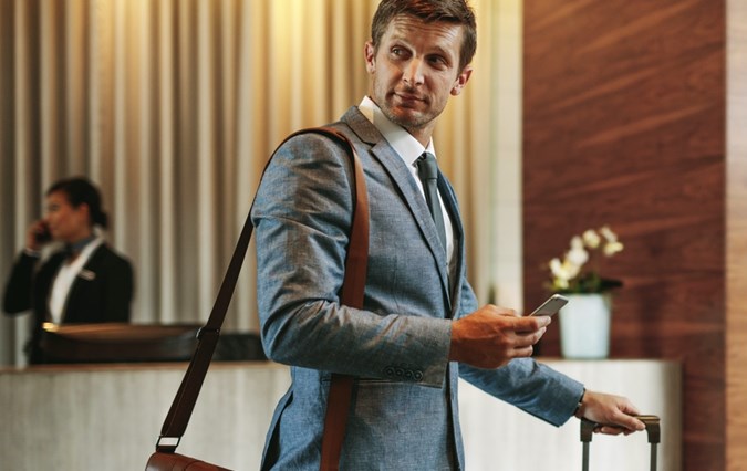Man passing through reception